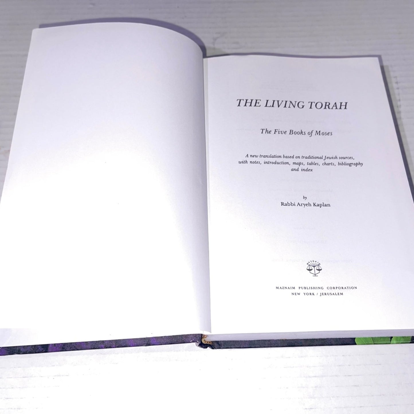 The Living Torah: A new Translation Based On Traditional Jewish Sources (The Five Books of Moses) 3rd by Aryeh Kaplan (1981) Hardcover